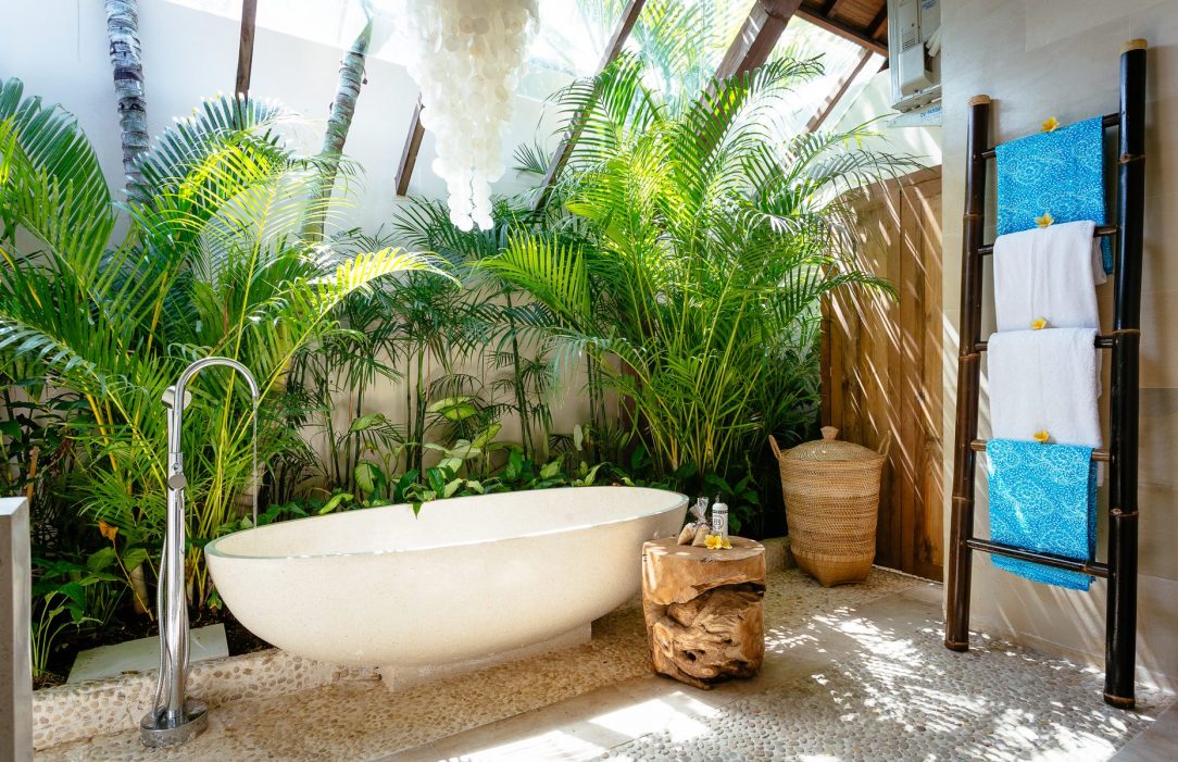 Seminyak Retreat Sanctuary Bathroom with Stone Bath- Bliss Sanctuary for Women At our beautifully appointed Seminyak sanctuary retreat we have an on-site yoga shala, two gorgeous outdoor living and dining spaces, daybeds around the sparkling pool, a beautiful shaded meditation pod to retreat into as well as an amazing tropical garden, with a massage bale overlooking the pool. So many poolside lounges and places to escape in this luxe environment for massages, meditation, sun-baking, reading and ultimate peace and relaxation.