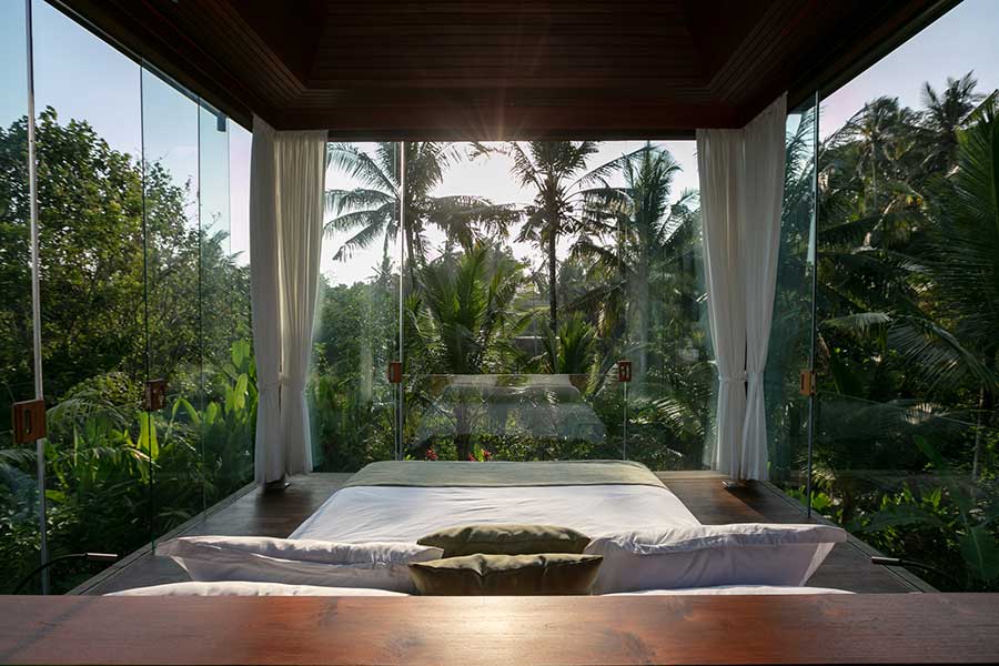 beautiful garden setting glass walls bedroom Ubud Bali resorts