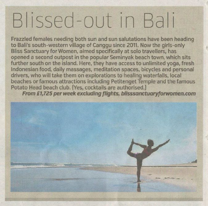newspaper clipping - yoga posing woman on Bali beach